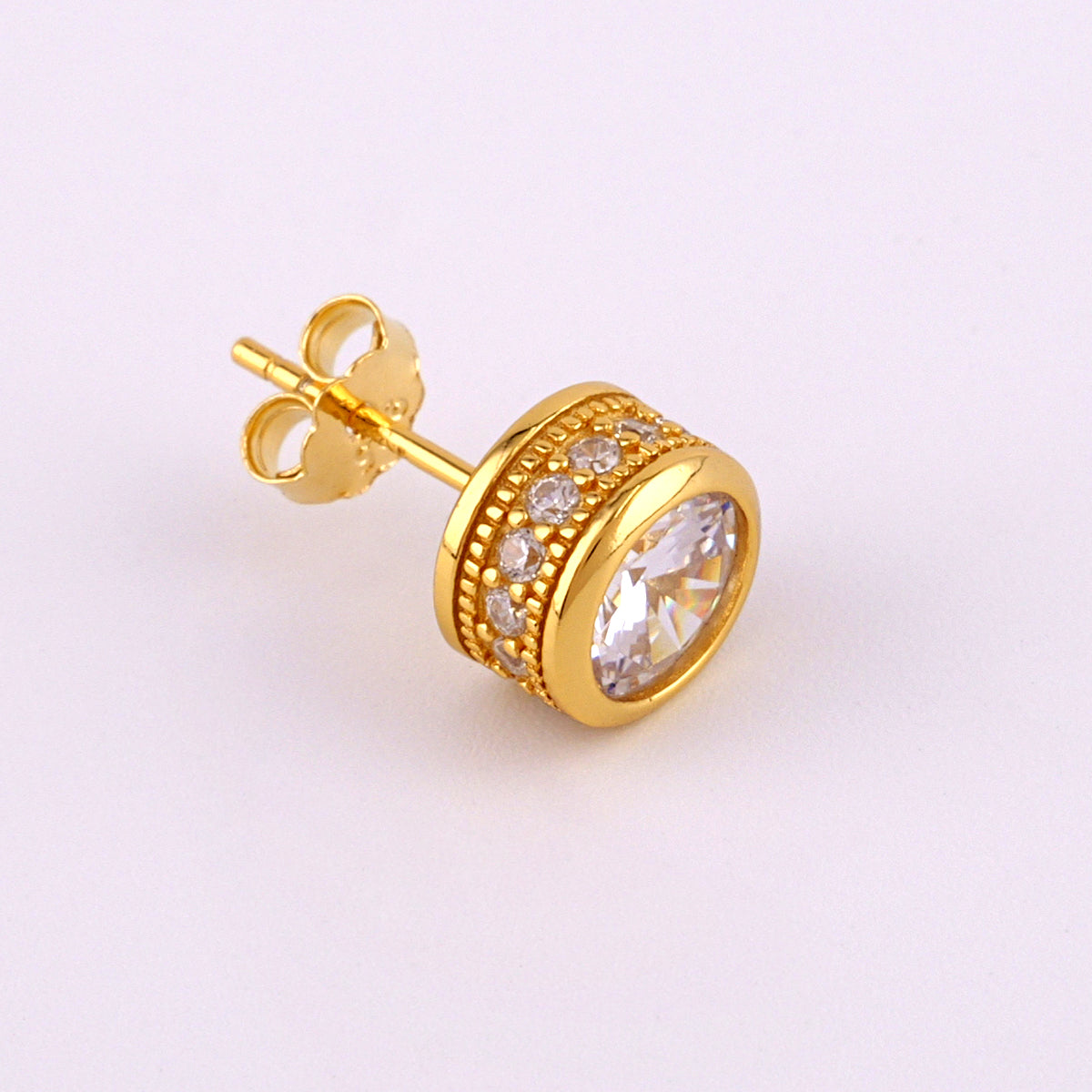 2.5 carat round CZ solitaire stud earrings in yellow gold over 925 sterling silver bezel settings