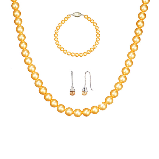 3-piece golden shell pearl jewelry set featuring 6mm round necklace, bracelet, and stud earrings