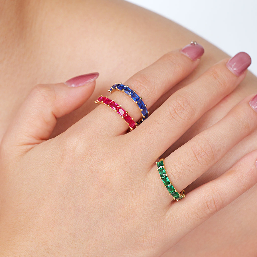 7-stone ruby band ring with octagon cut simulated rubies in yellow gold plated silver