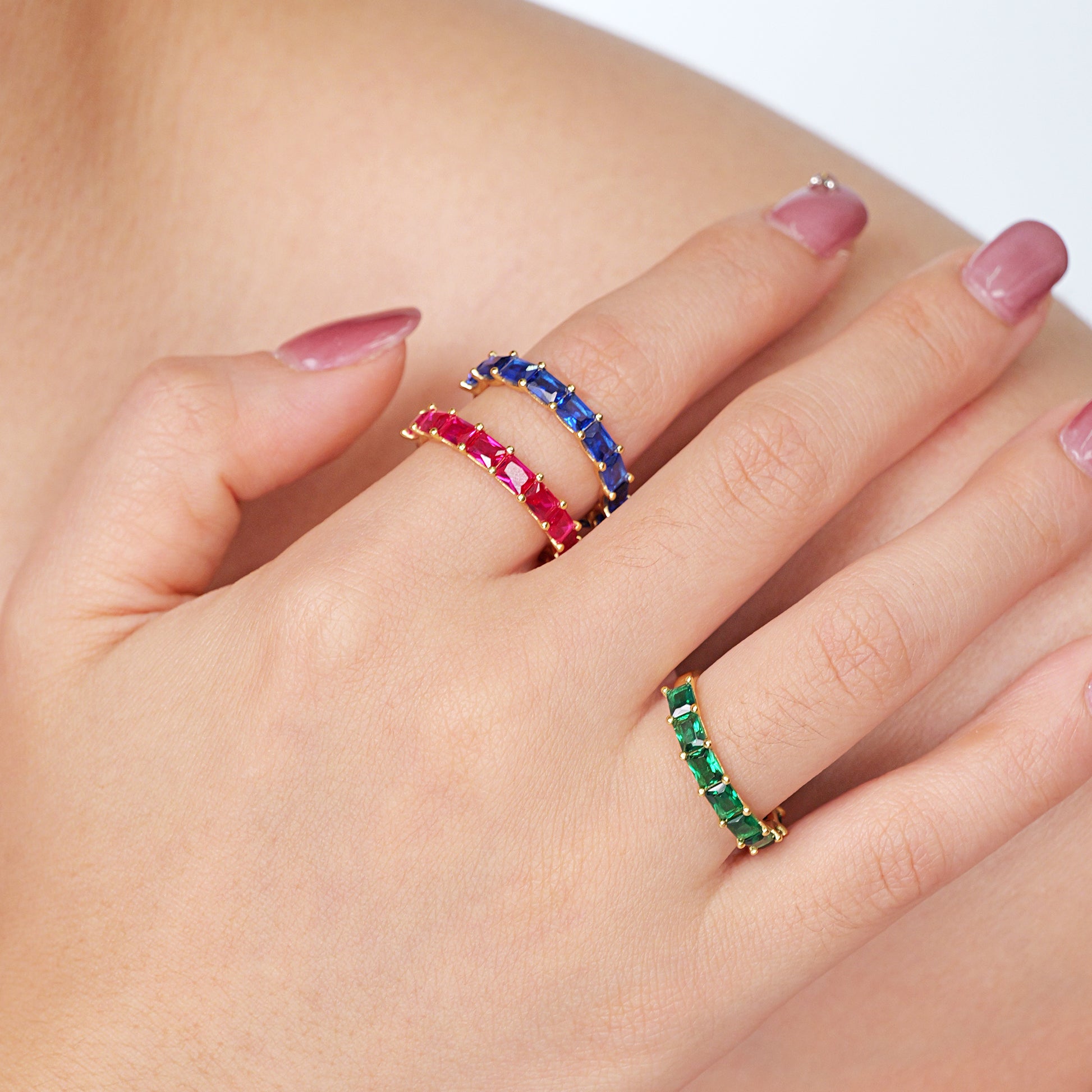 7-stone ruby band ring with octagon cut simulated rubies in yellow gold plated silver
