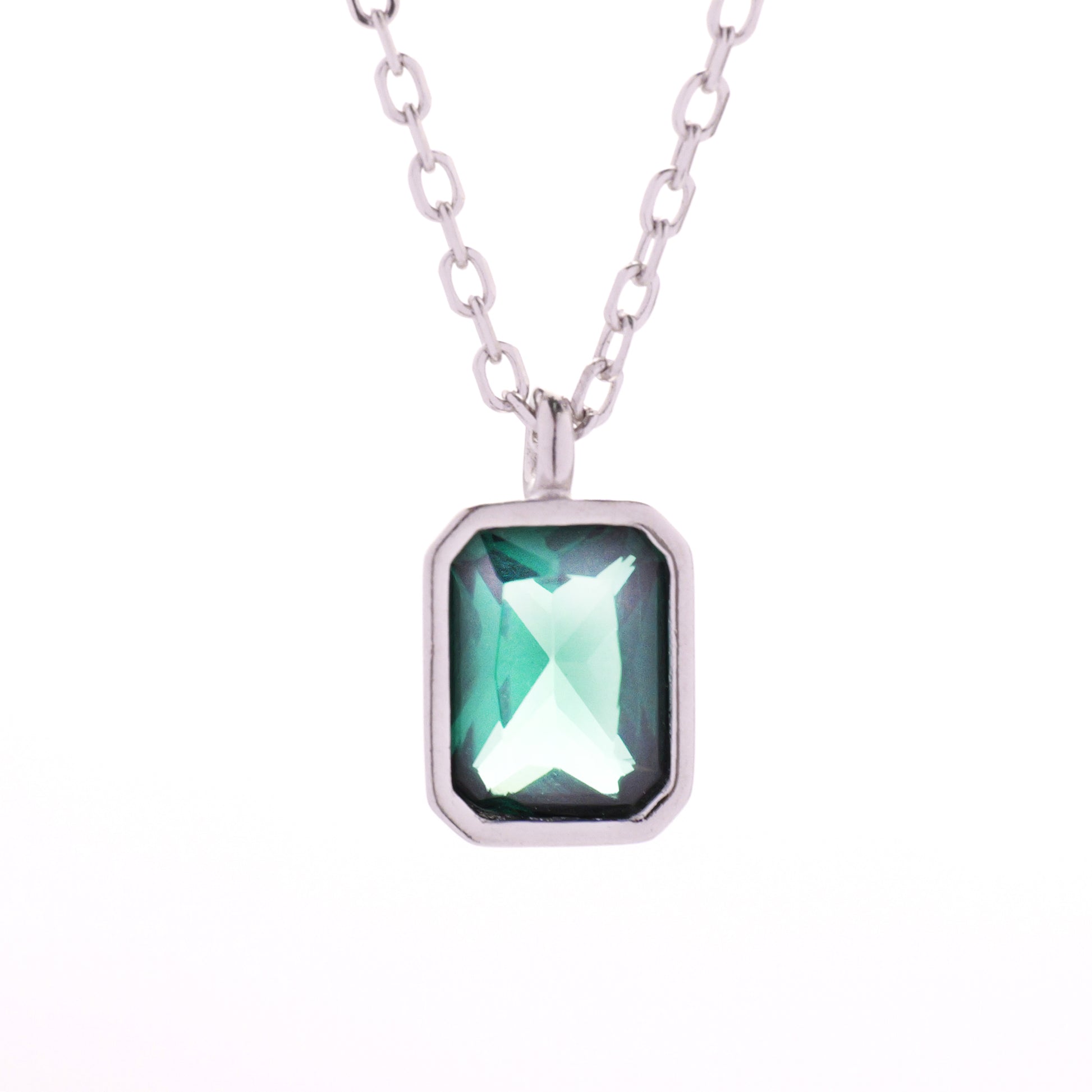 925 hallmark and the clean geometric lines of the octagon-cut gemstone