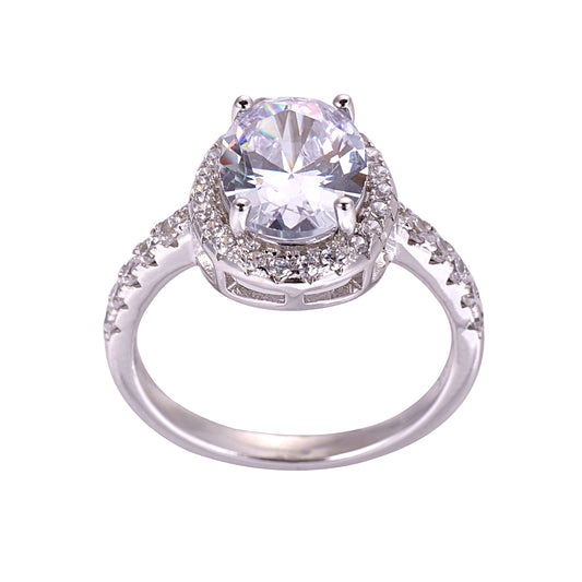 A sterling silver halo solitaire ring with an oval-cut cubic zirconia centerpiece and smaller stones around it.