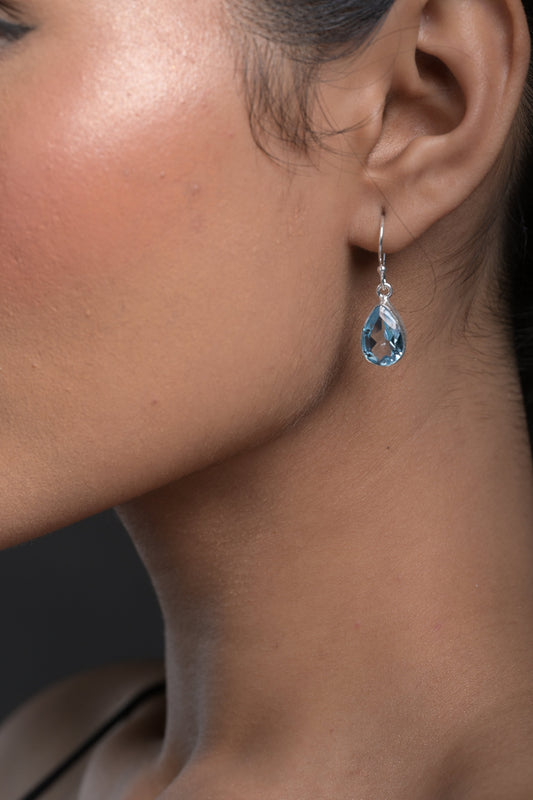 Elegant blue gemstone earrings styled for everyday wear