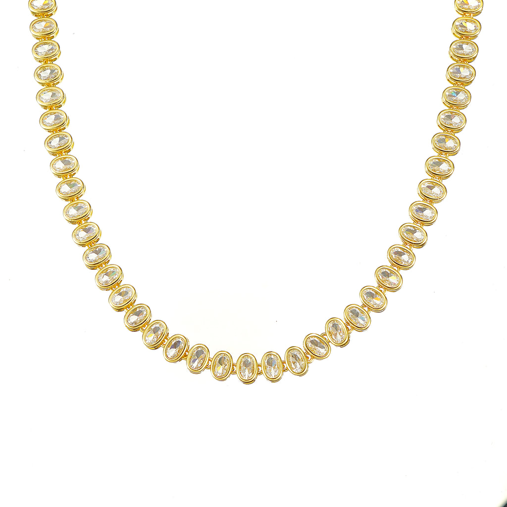 A gold-plated tennis necklace with oval-cut sparkling simulated diamond CZ.