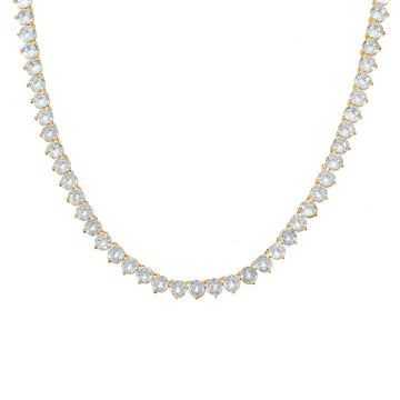 A gold-plated tennis necklace with round cut sparkling stones 