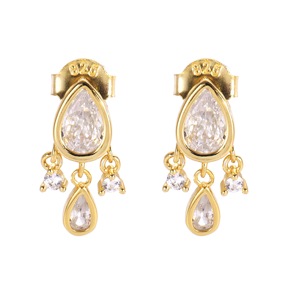 A pair of elegant dangle earrings with pear-shaped clear cubic zirconia stones set in gold-tone mountings.