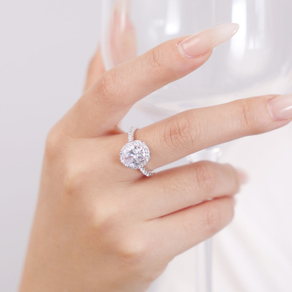925 sterling silver halo solitaire ring with an oval-cut center CZ