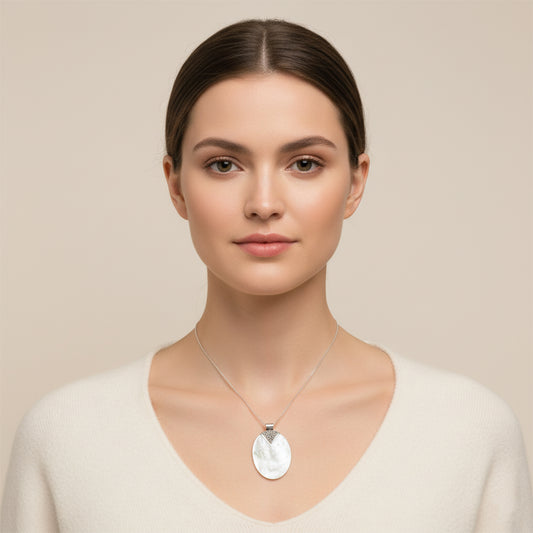 Enchanting Bali Handmade Oval Mother Of Pearl Pendant in Sterling Silver