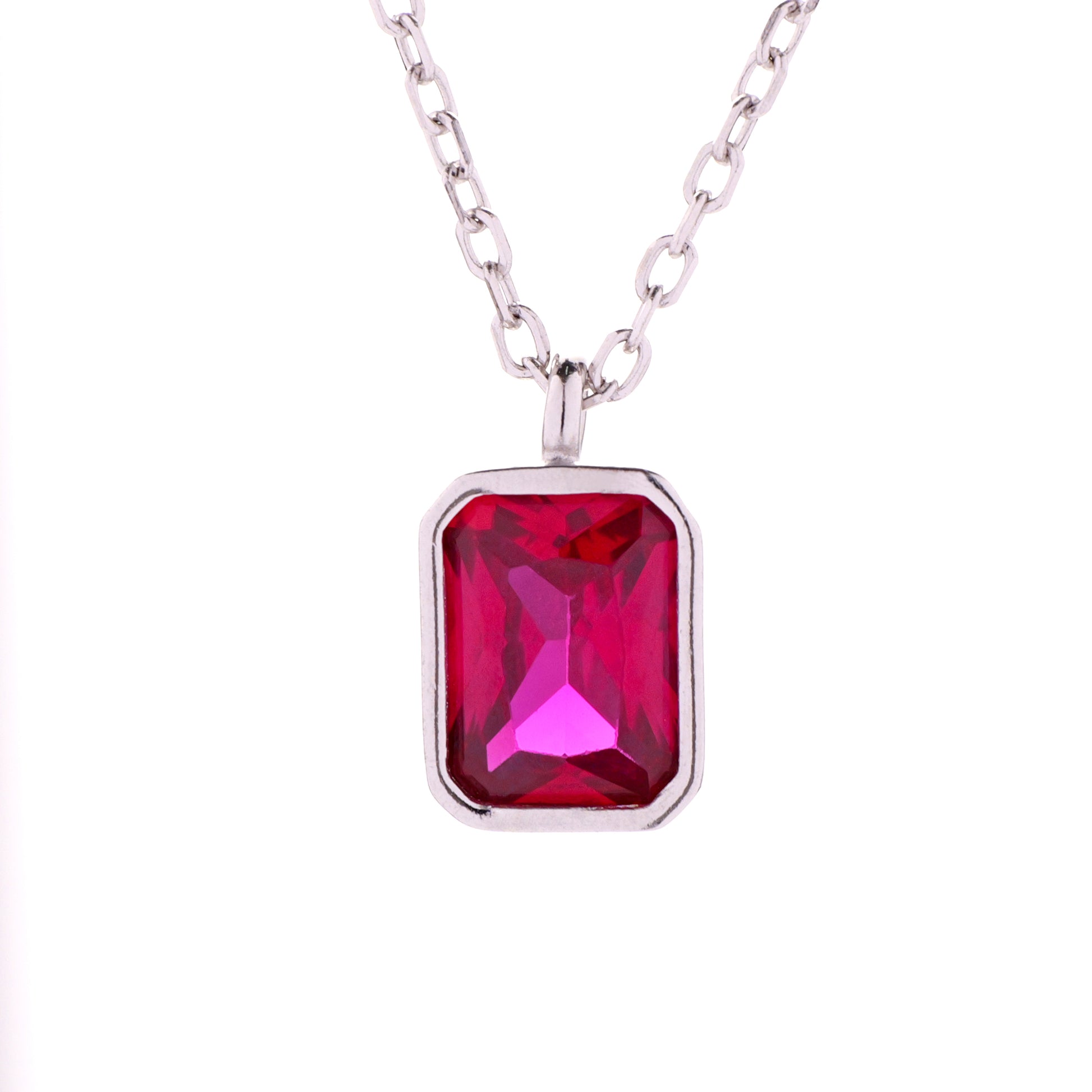 Close-up of a minimalist .925 sterling silver necklace featuring a bezel-set octagon-cut CZ pendant