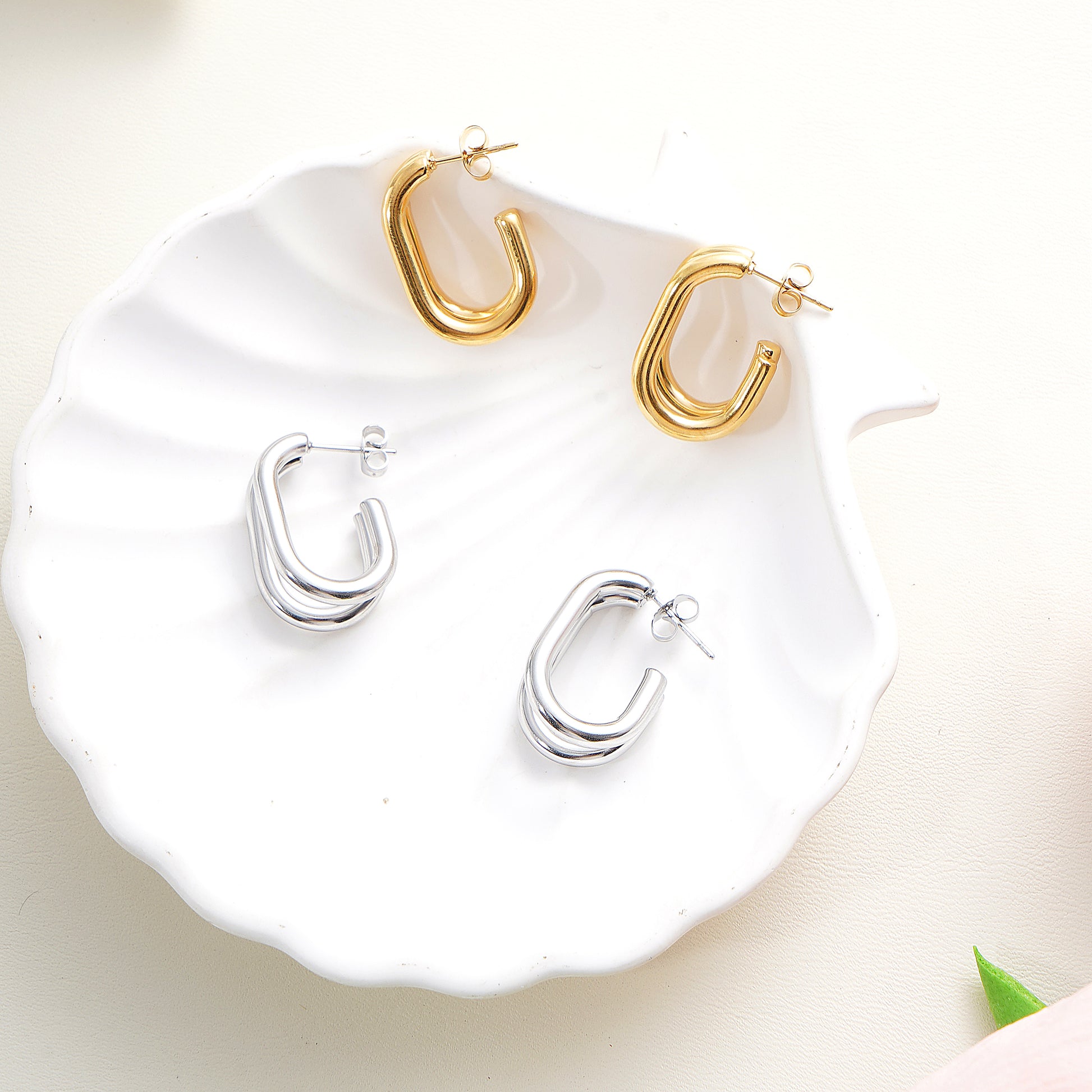 Close-up of the secure hinge closure on the stainless steel double hoop earrings