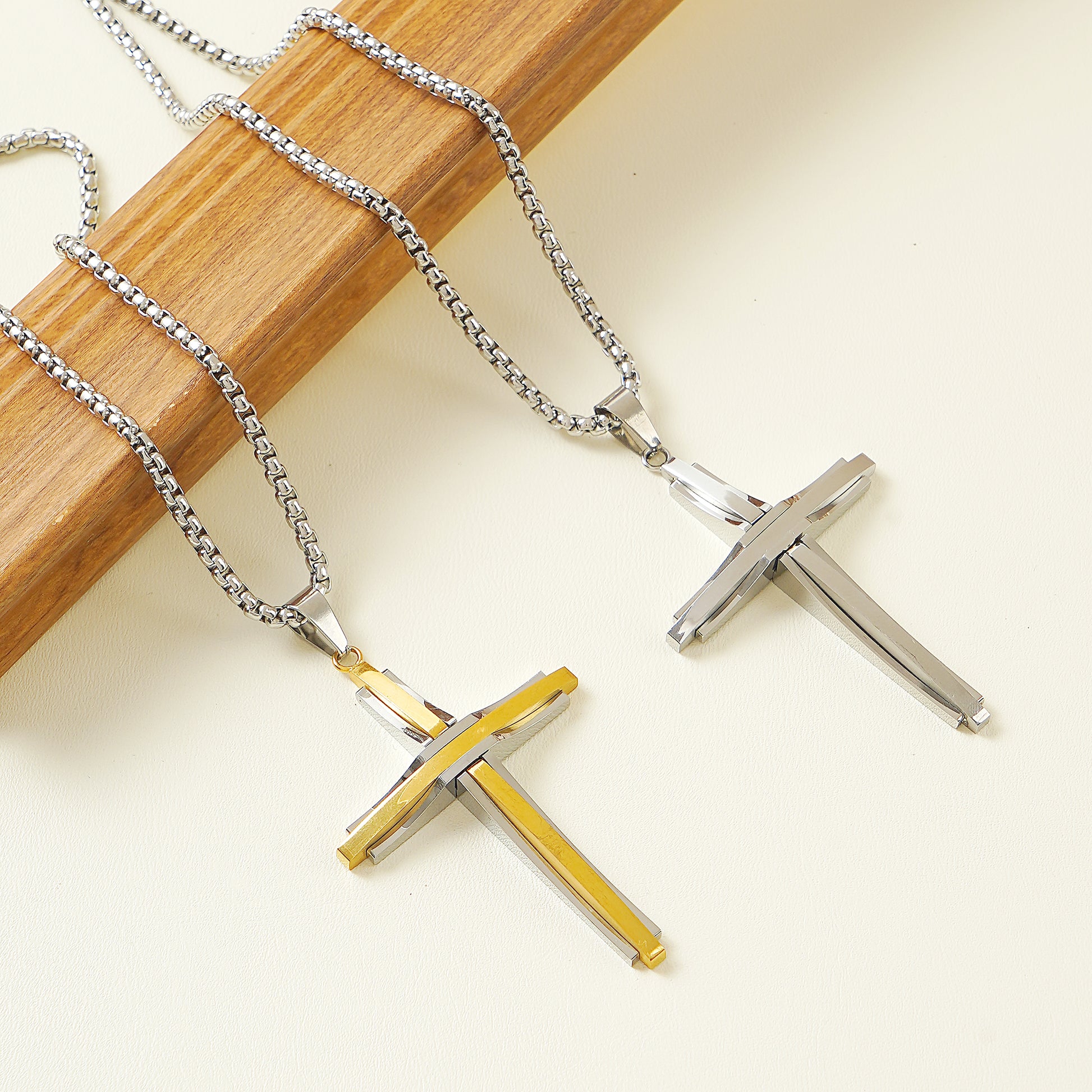 316L stainless steel cross pendant necklace with a high-polish finish and 24 inch chain.