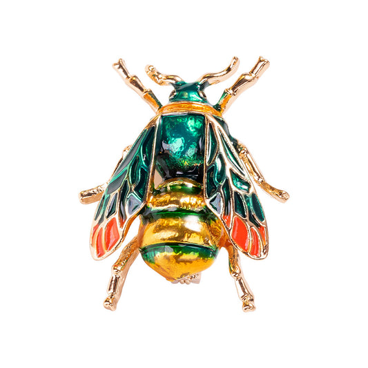 Colorful bee-shaped brooch on a white background
