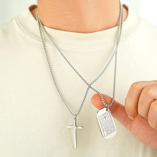 Man wearing a 24 inch stainless steel Lord's Prayer dog tag necklace with cross charm.