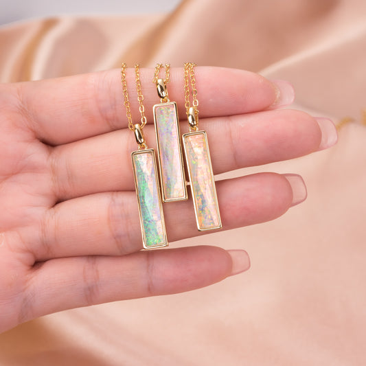 Elongated Fancy Cut simulated Welo Opal Pendant Necklace with Surgical Steel Chain 20 Inch