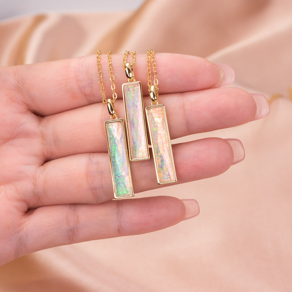 Elongated Fancy Cut simulated Welo Opal Pendant Necklace with Surgical Steel Chain 20 Inch
