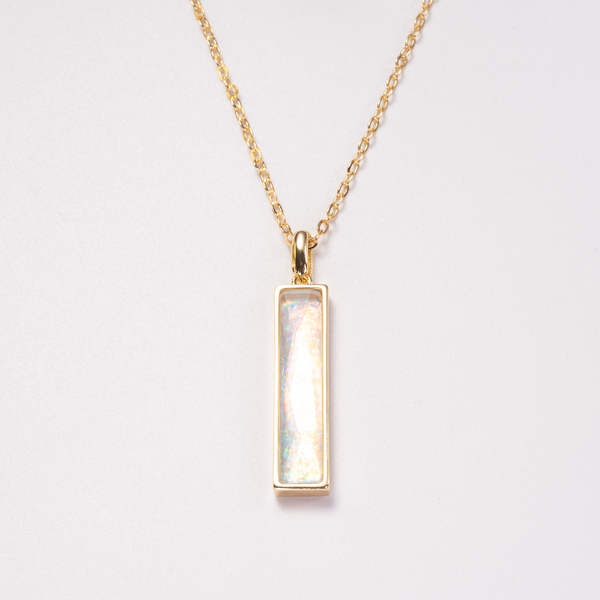 Elongated Fancy Cut simulated Welo Opal Pendant Necklace with Surgical Steel Chain 20 Inch