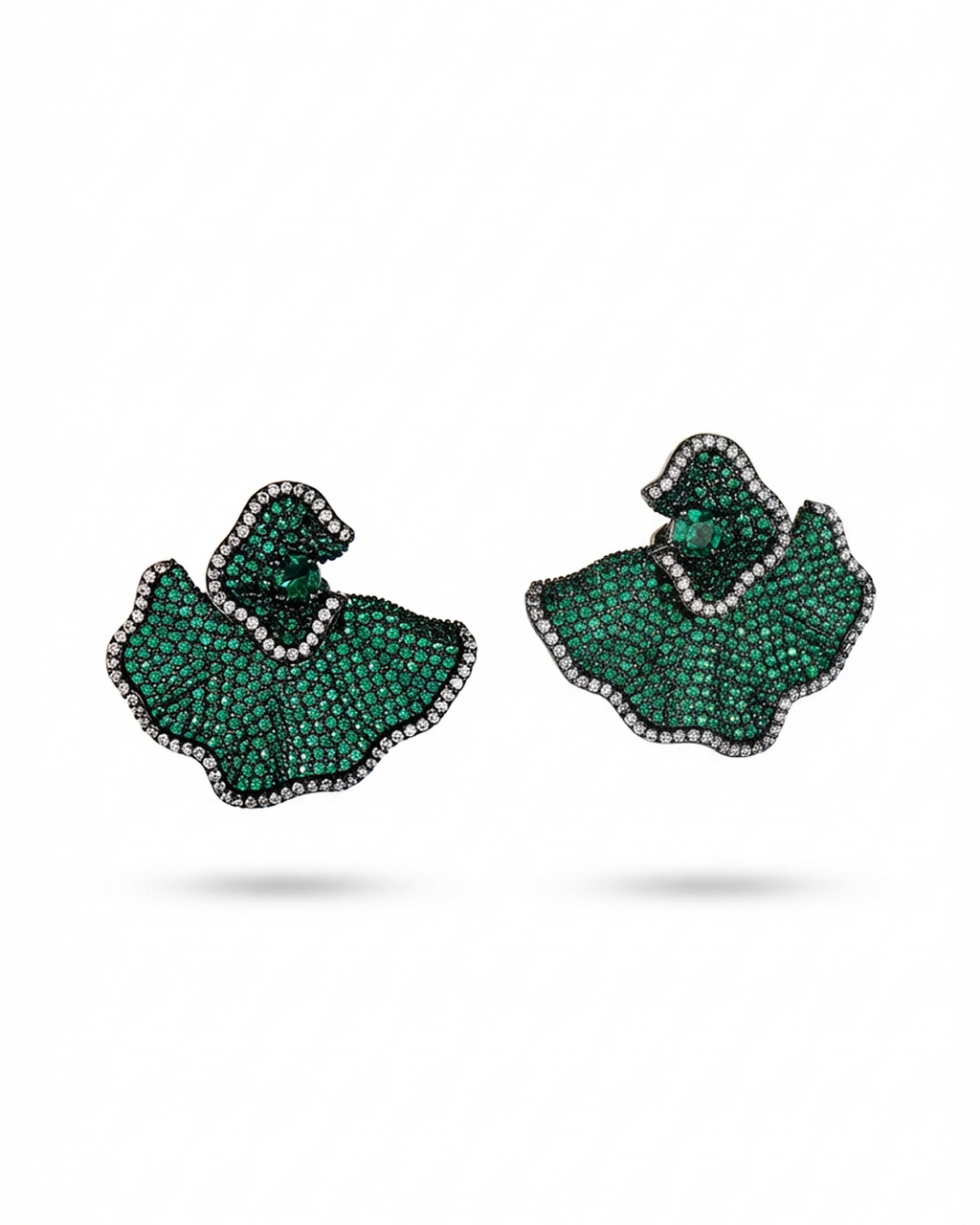 Pair of green gemstone earrings on a white background