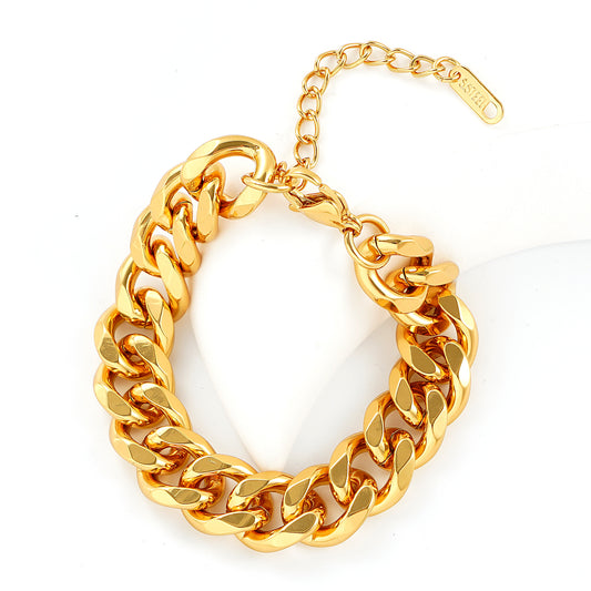 Gold chain bracelet on a white background