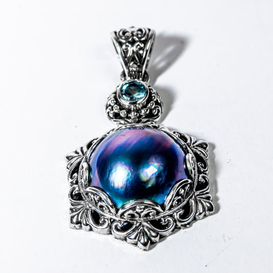 Enchanting Bali Handmade Peacock Mabe Pearl and Sky Blue Topaz pendant in Sterling Silver