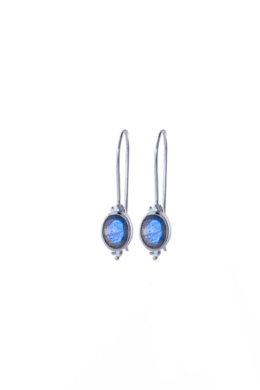 Pair of silver earrings with Labradorite gemstones on a white background