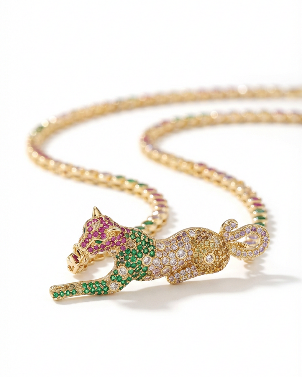 Gold necklace with a colorful panther pendant on a white background