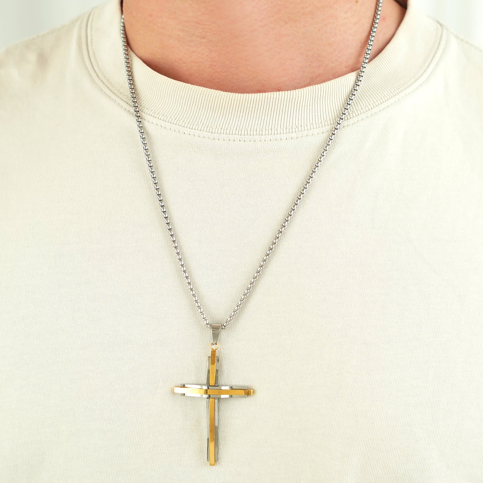 316L stainless steel cross pendant necklace with a high-polish finish and 24 inch chain.