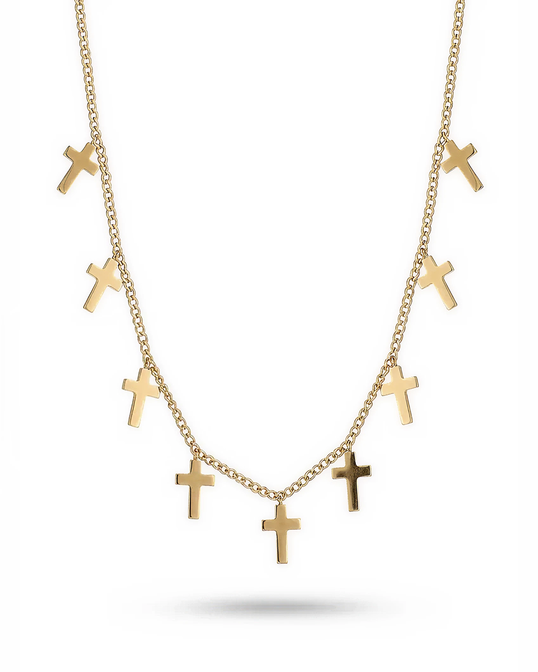 Minimalist 18k gold IP stainless steel cross charm necklace on a thin cable chain.