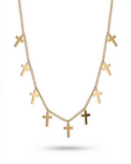 Minimalist 18k gold IP stainless steel cross charm necklace on a thin cable chain.