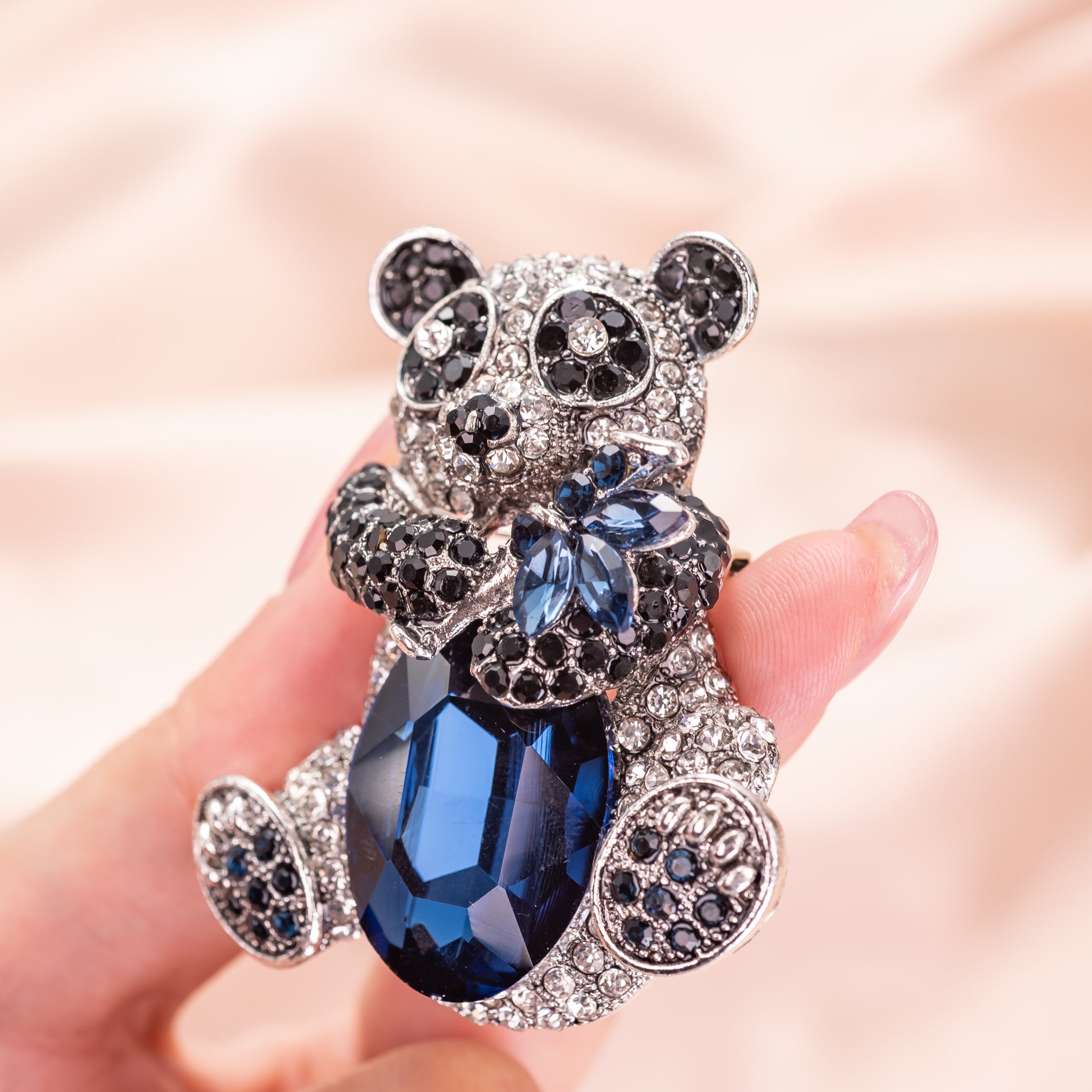 Panda pendant necklace with black and white crystals on a 20-inch silver chain