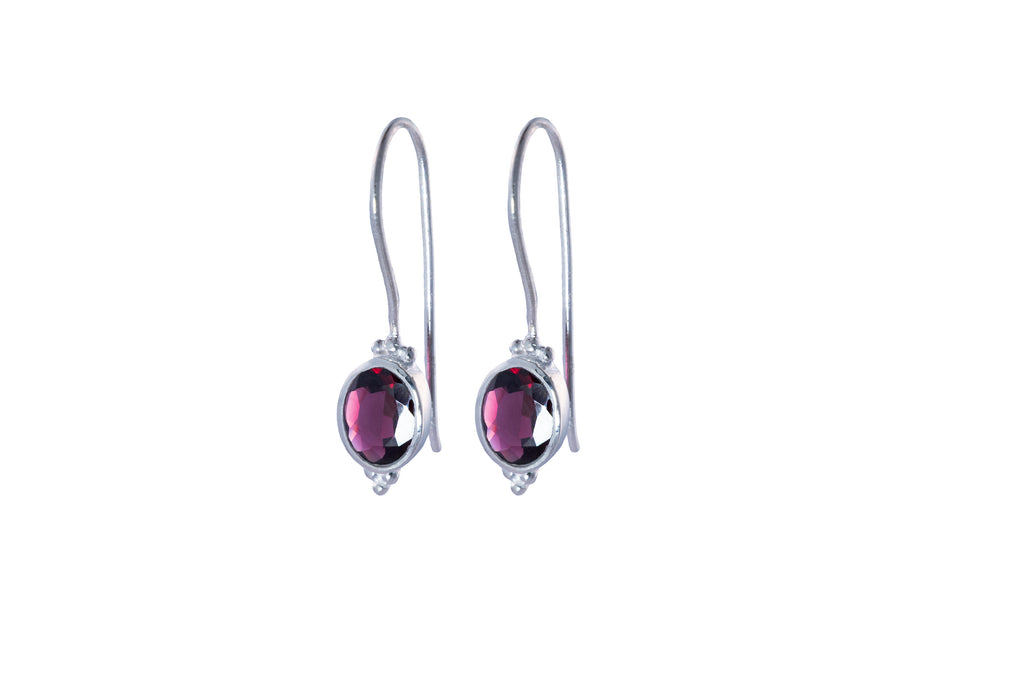Silver earrings with Red Garnet gemstones on a white background