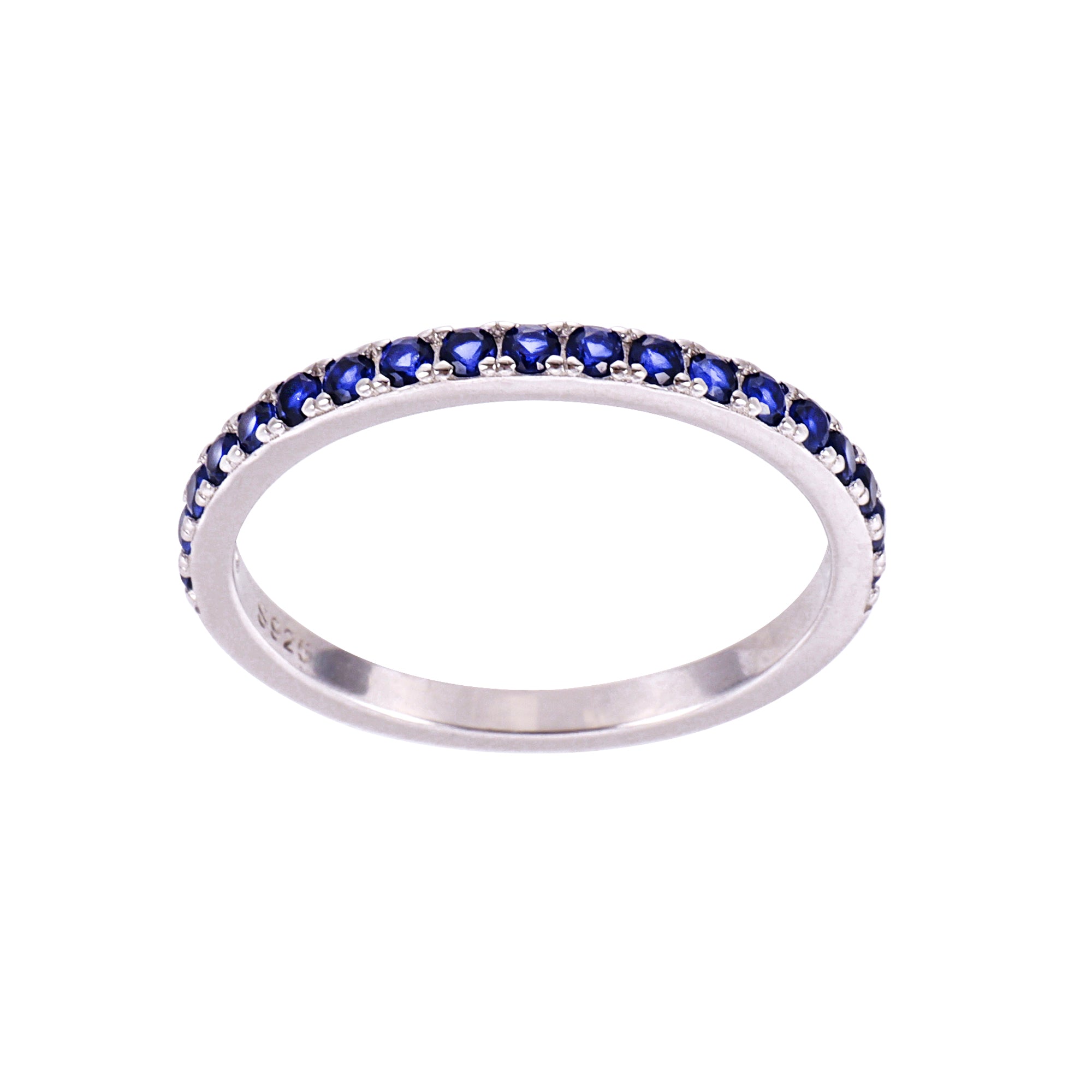Silver ring with blue gemstones on a white background