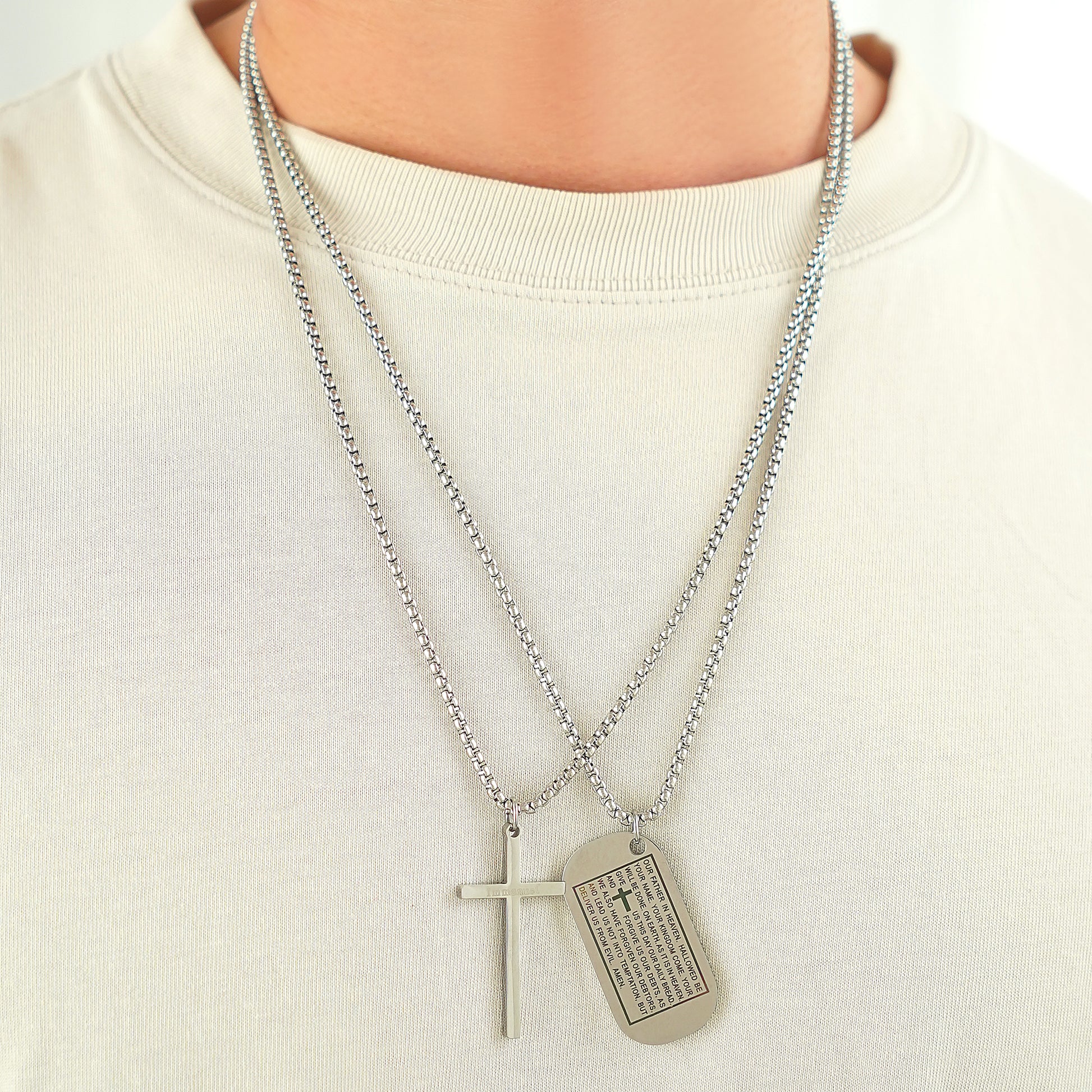 Silver tone Lord's Prayer necklace on woman, showing 24 inch length and fit.