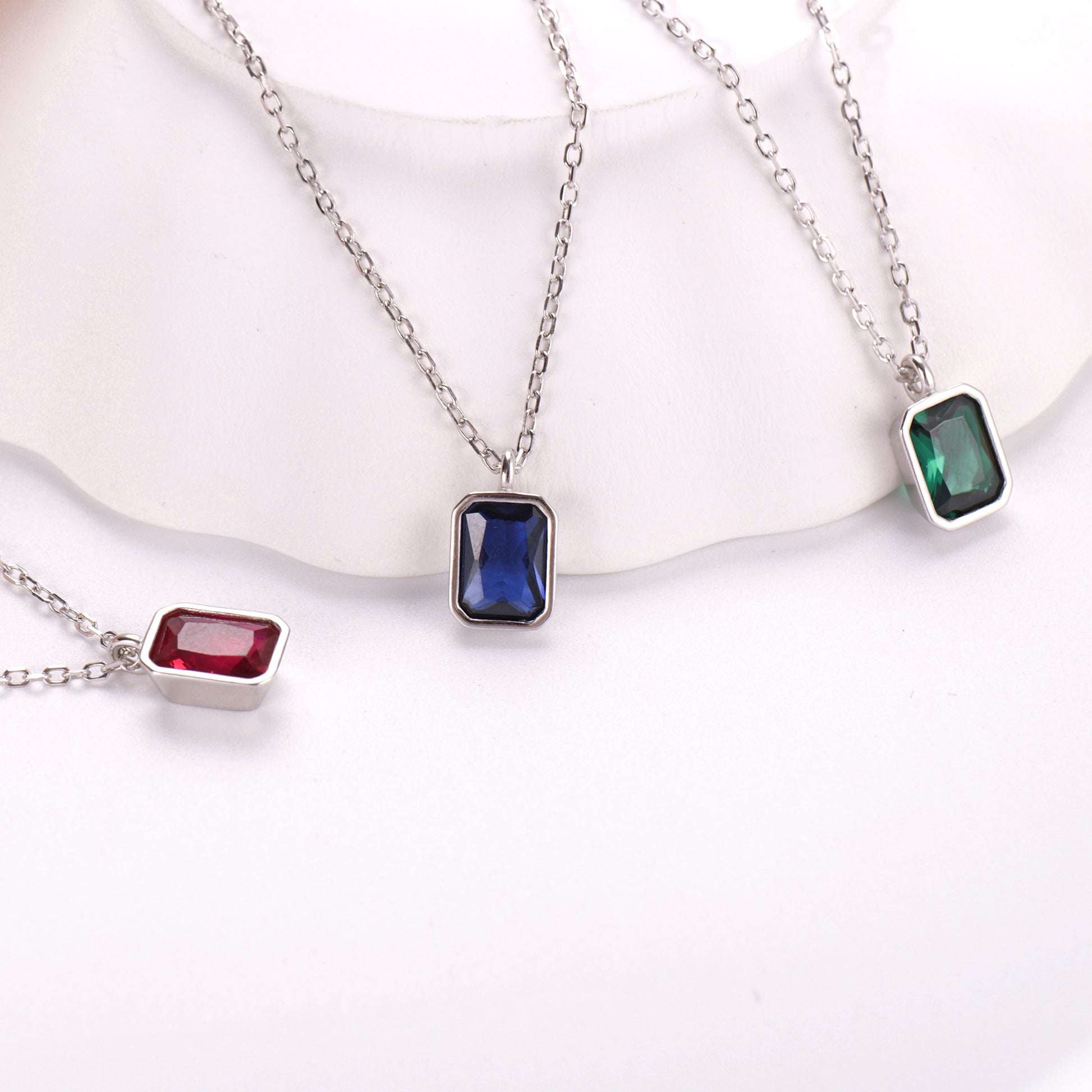 925 hallmark and the clean geometric lines of the octagon-cut gemstone