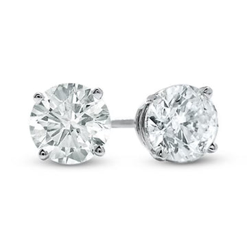 Pair of moissanite stud earrings on a white background