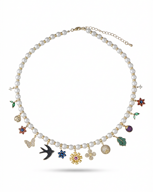 Necklace with Fresh Water Shell pearl  and various colorful charms on a white background-Stars and Vogue