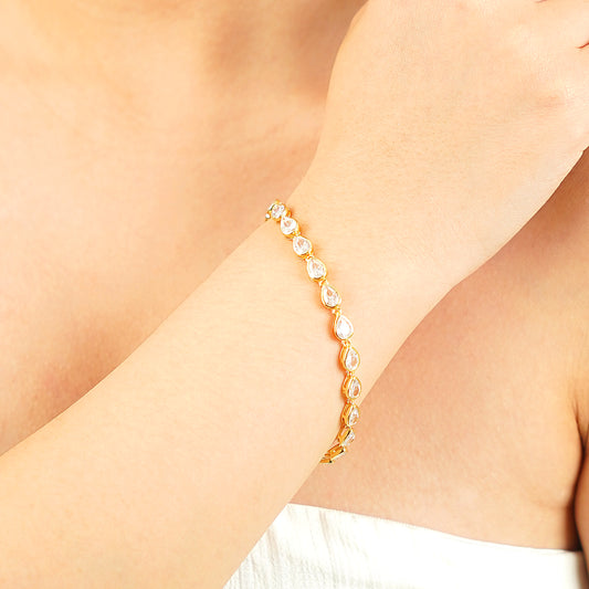 7-inch pear-cut CZ tennis bracelet in 18k yellow gold over brass