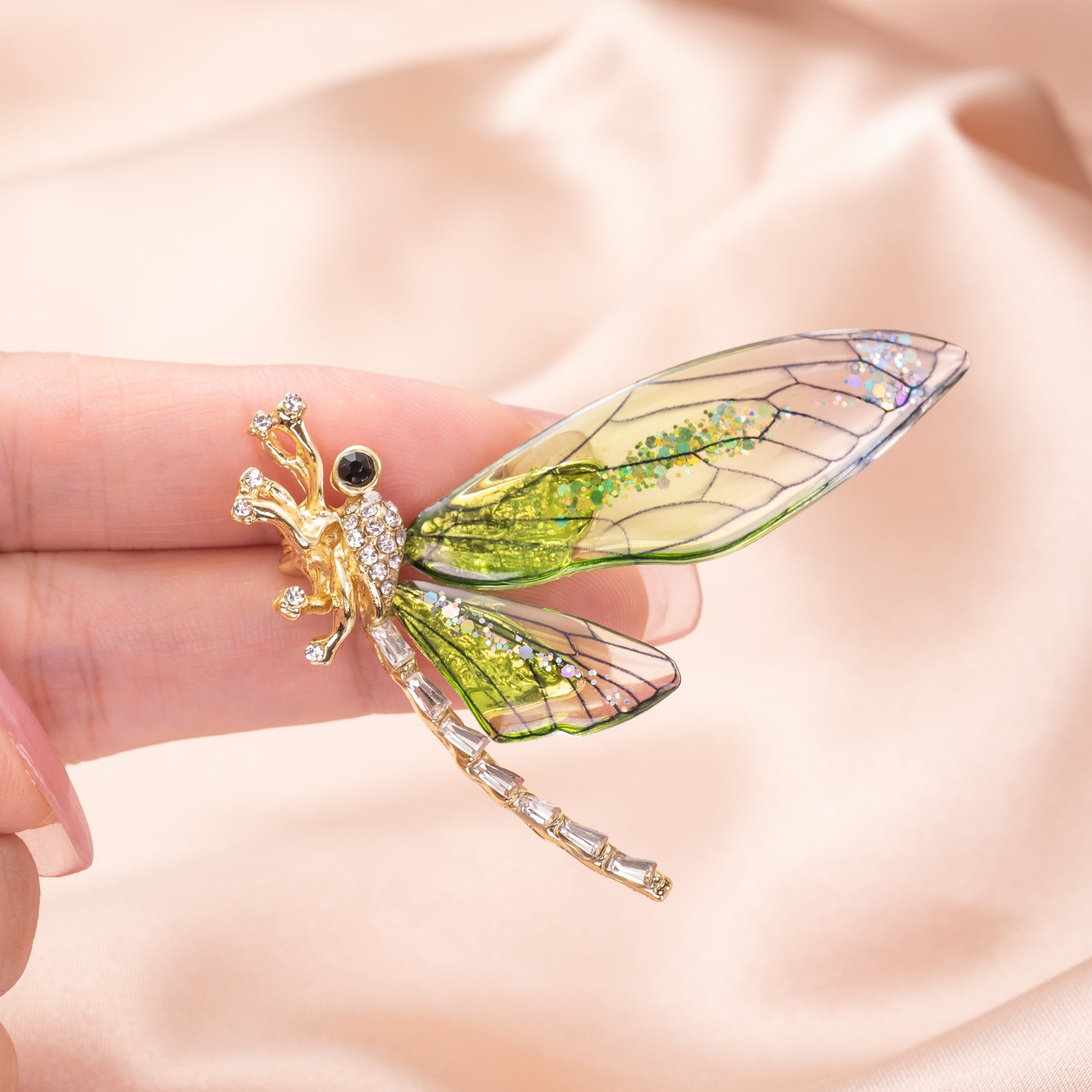Yellow gold over brass pin adorned with sparkling crystals