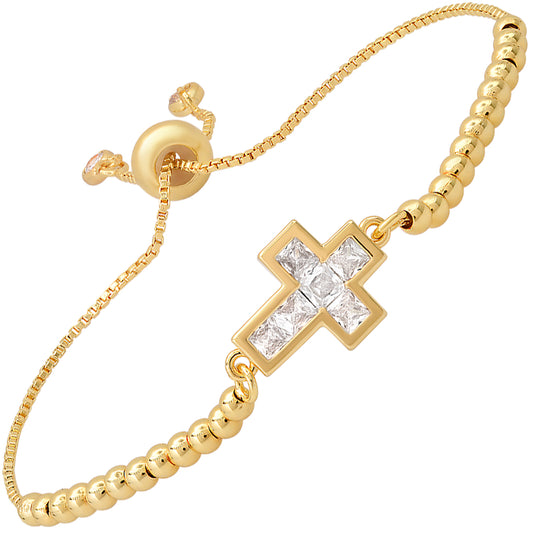 yellow gold plated brass cross bracelet with cubic zirconia stones.