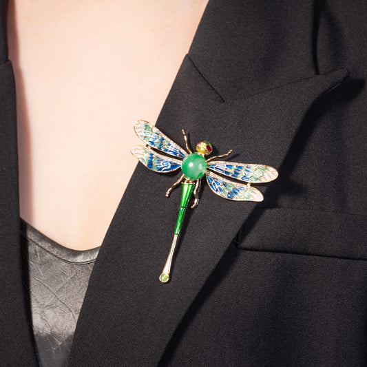 dragonfly enameled brooch pin with vibrant wings and a sparkling crystal center stone
