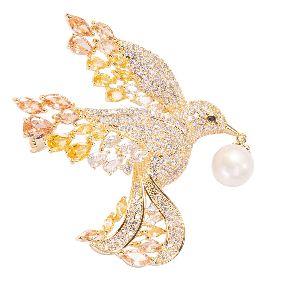 gold dove brooch pinned to a navy blue blazer lapel
