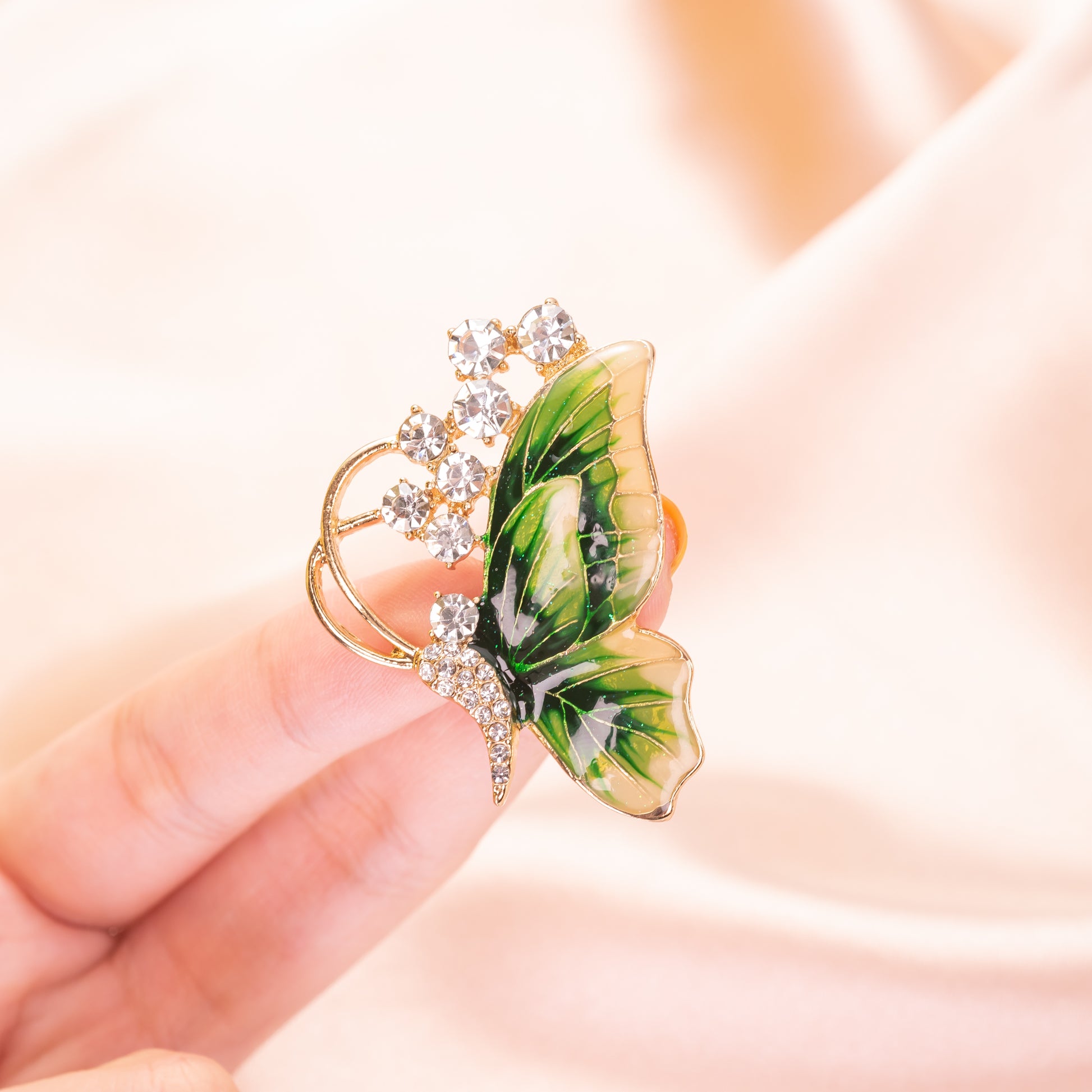 green enamel butterfly brooch pin with sparkling crystal wing accents