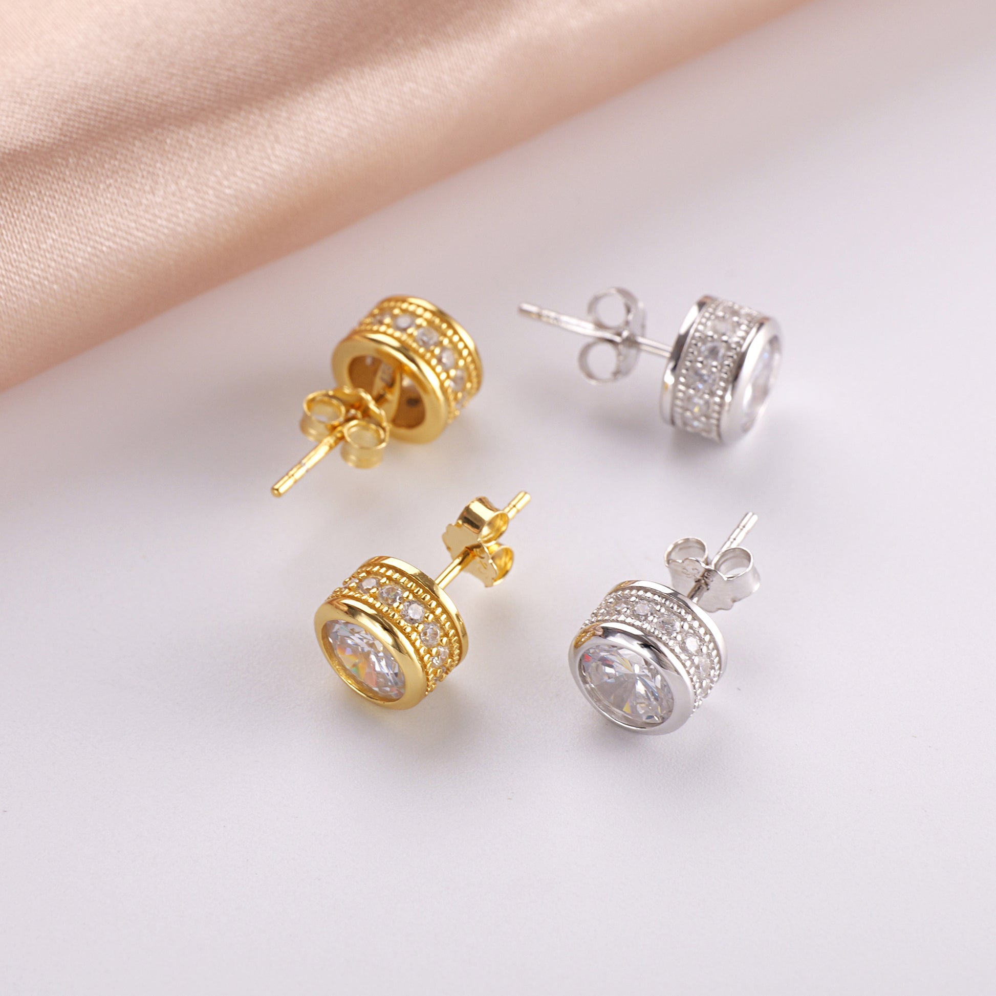 2.5 carat round CZ solitaire stud earrings in yellow gold over 925 sterling silver
