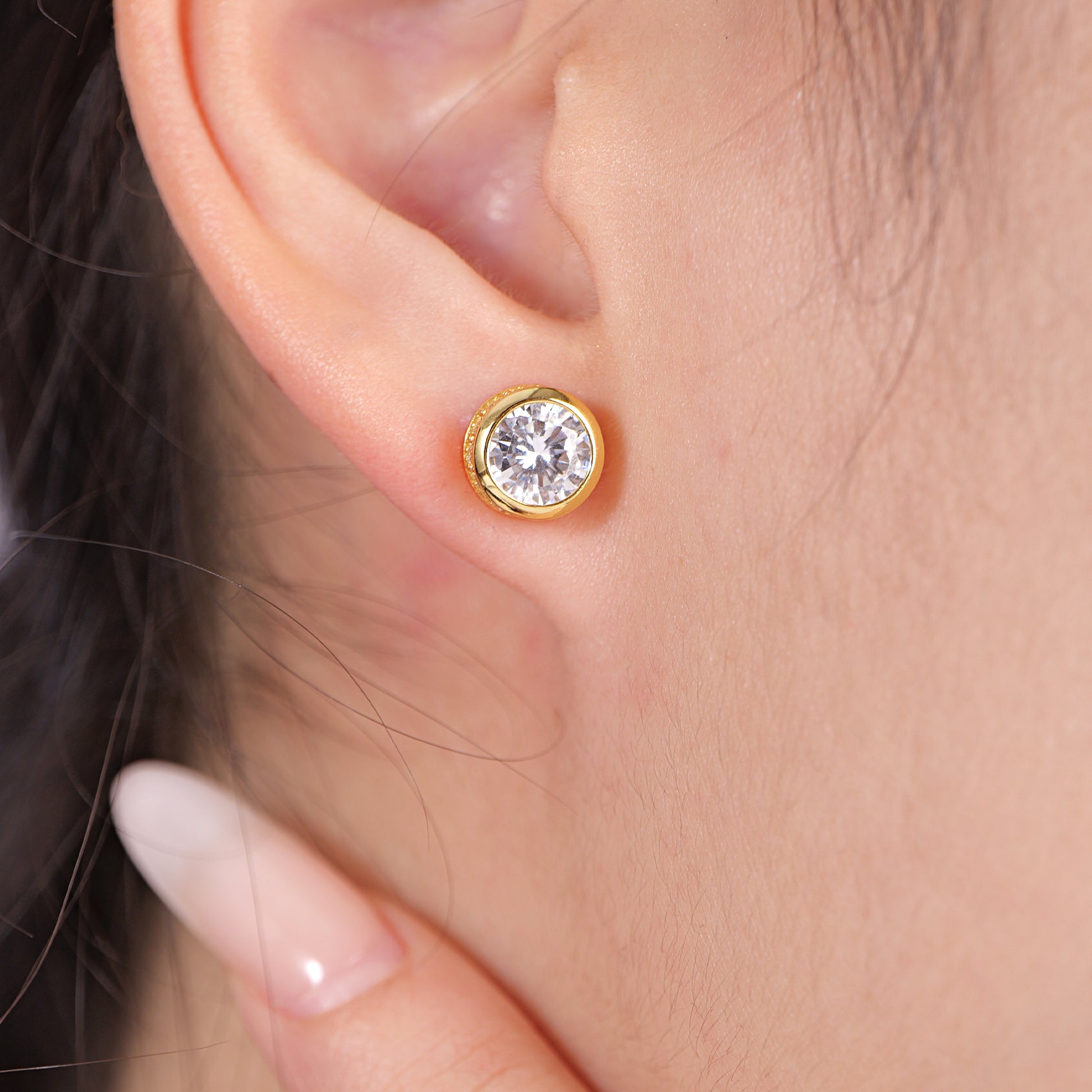 round CZ solitaire stud earrings in yellow gold over 925 sterling silver