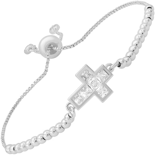 white gold cross bracelet showing the silver-tone finish.